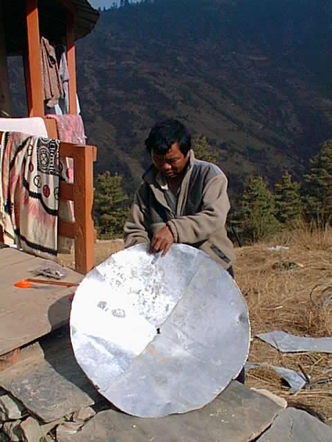 Hand-making a satellite dish in Nepal